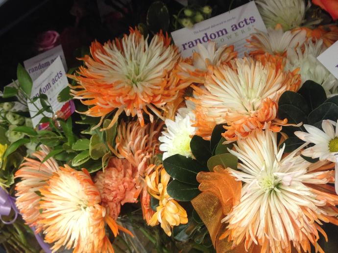 Orange and white mums with delivery cards